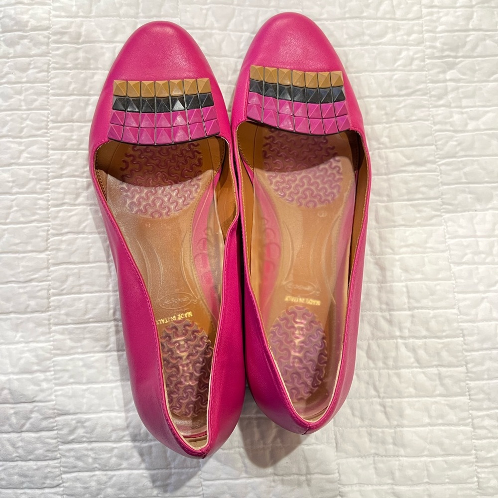 Fendi- Purple with brown,black and purple studs. Shoes are slip ons.